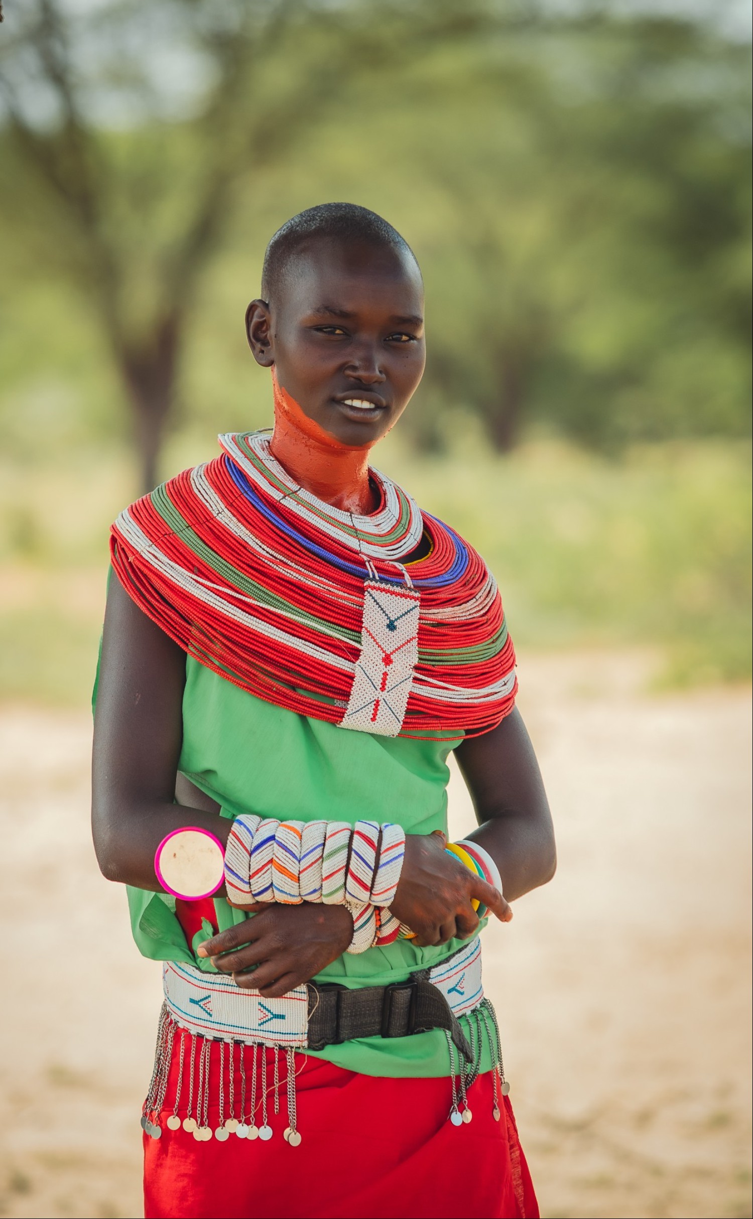 Colours of Heritage: Young Samburu Woman in Traditional Colourful Beadwork and Green Attire