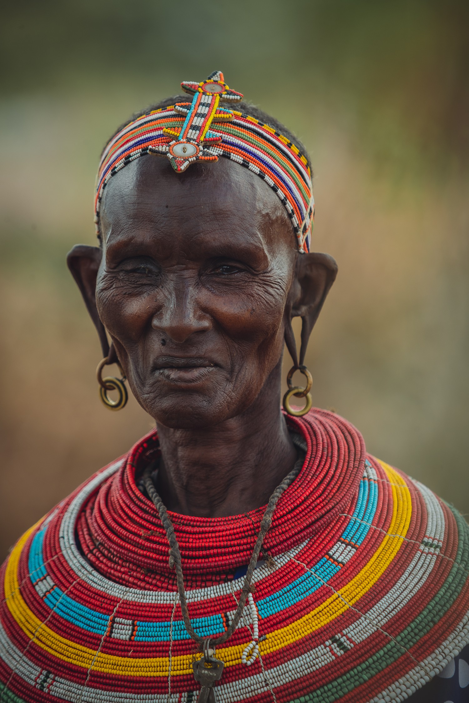 Timeless Adornment: Elder Samburu Woman in Traditional Beadwork.