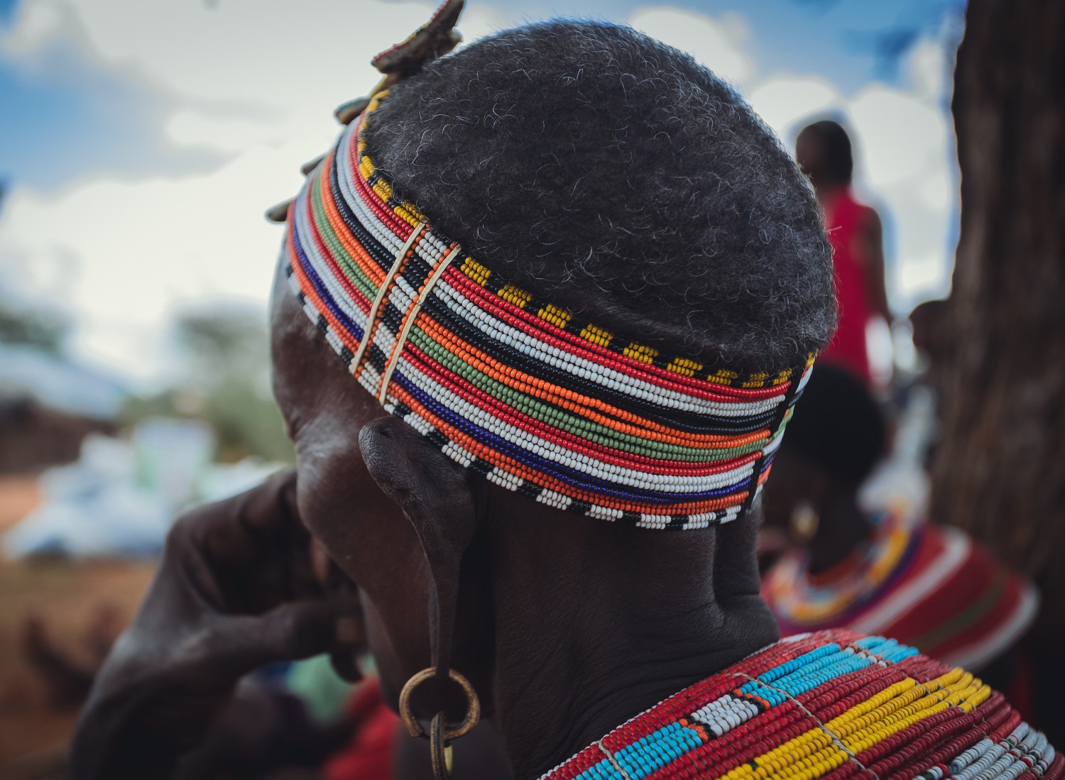 Hair Adorned: Samburu Woman in Traditional Colourful Beaded Headwear.